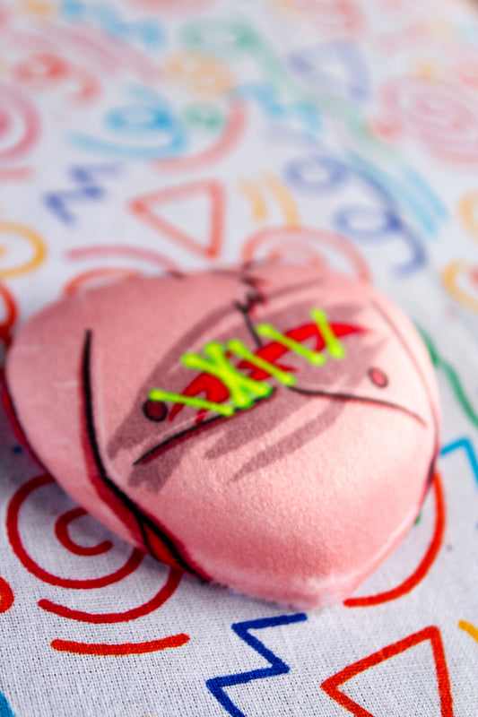 Alastor chest plush heart badge