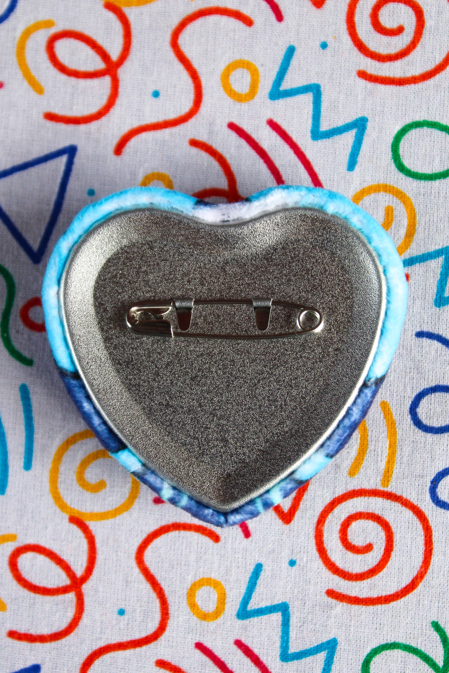 Vox chest plush heart badge