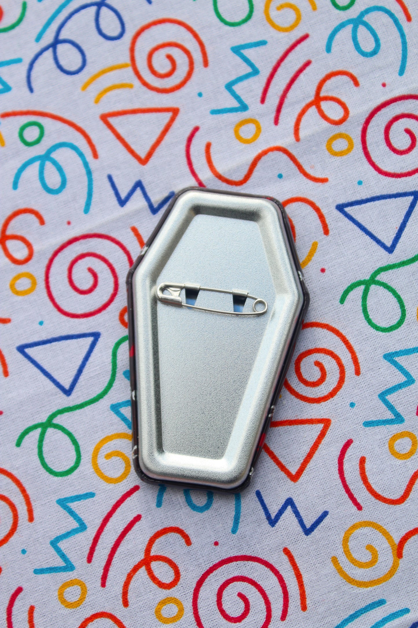 Magnus coffin badge